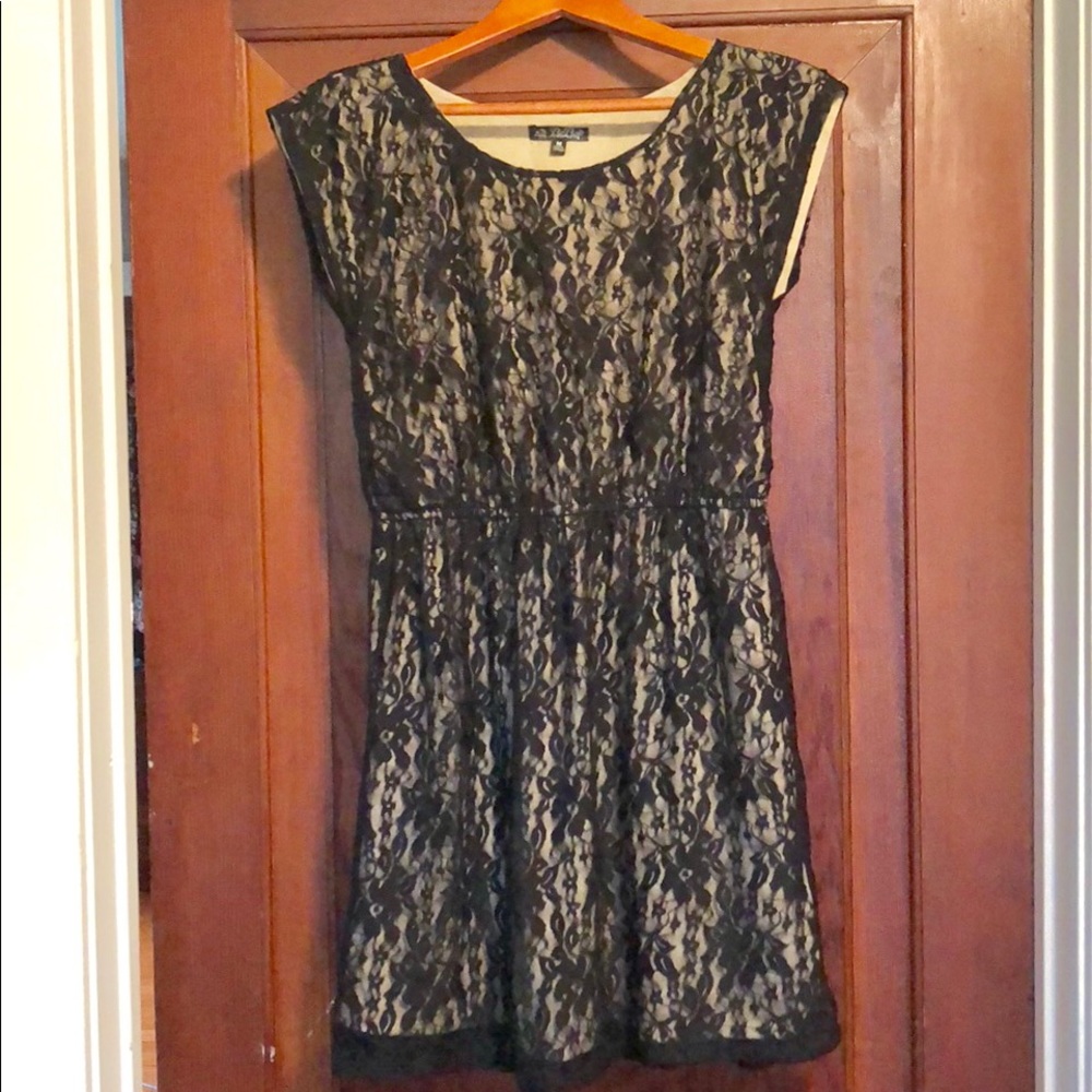 Black lace overlay with cream